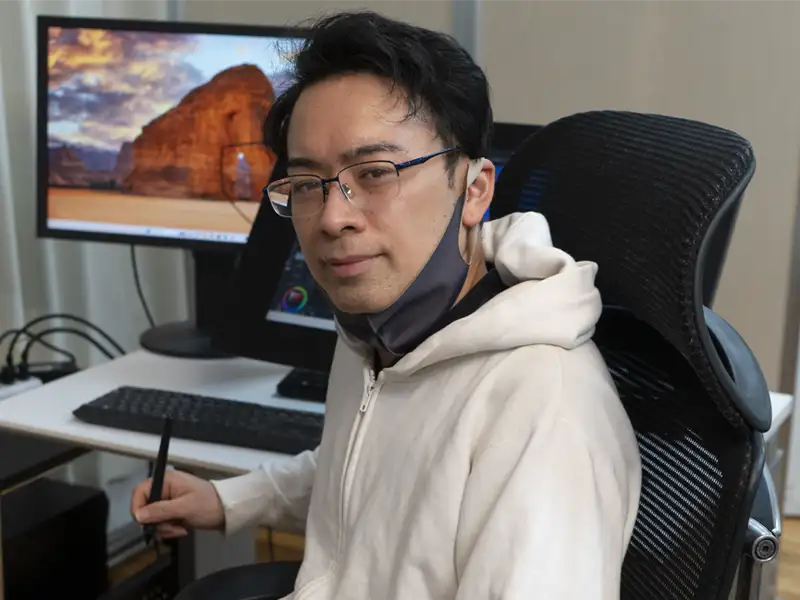 体験の様子2カメラ目線の男性